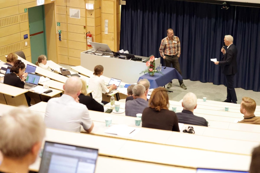 Group of people attending a conference.